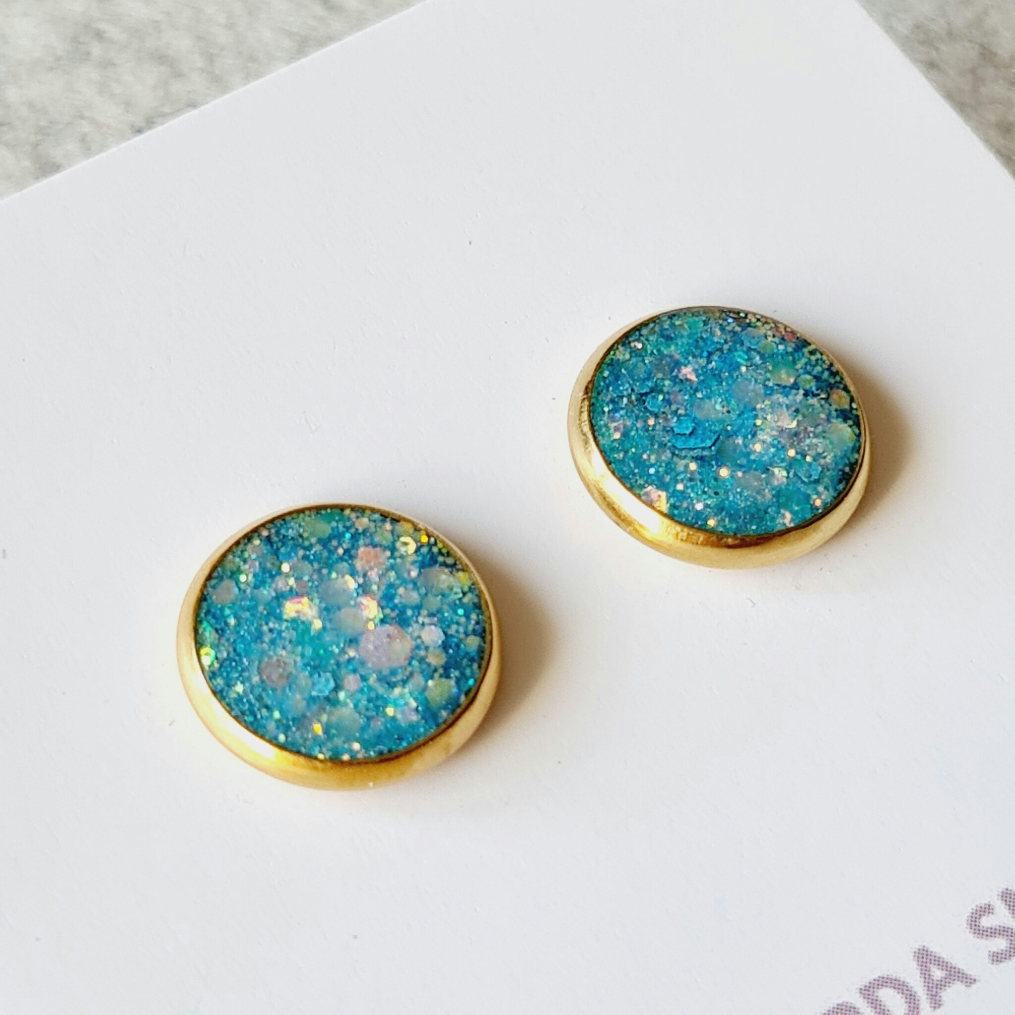 Örhänge guld - turkos glitter (14 mm)