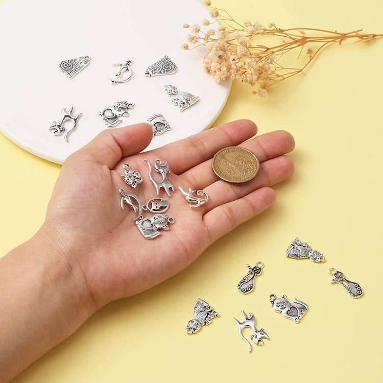 Mix av silver-berlocker - 30st