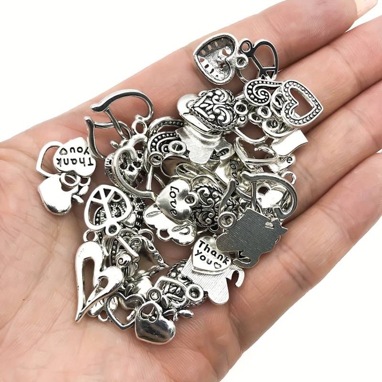 Mix av silver-berlocker - 30st