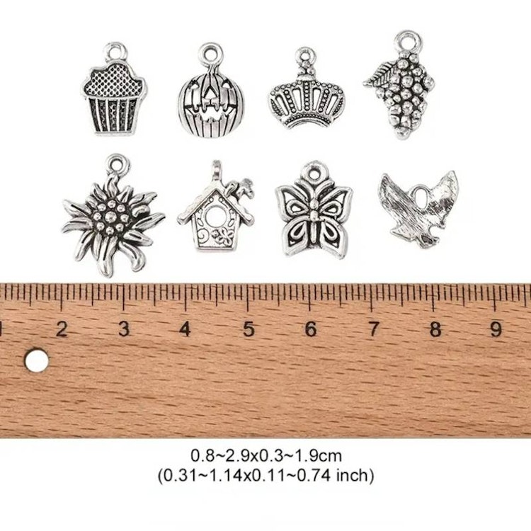 Mix av silver-berlocker - 30st