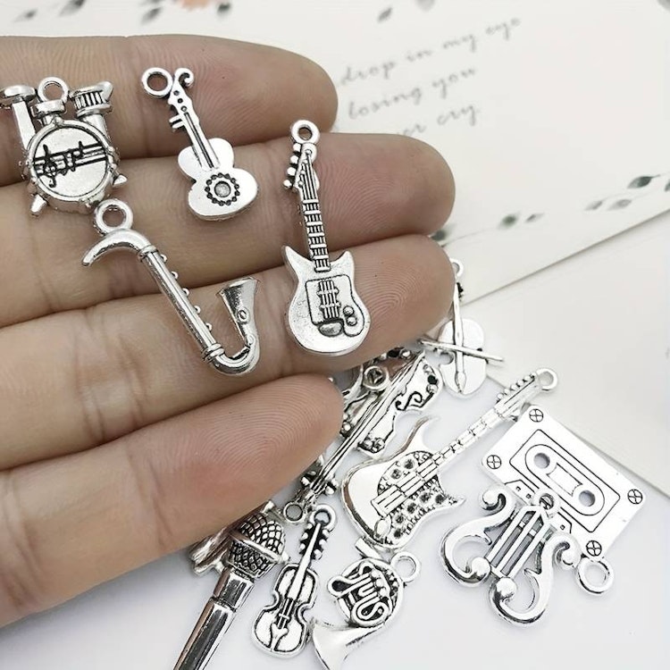 Mix av silver-berlocker - 30st