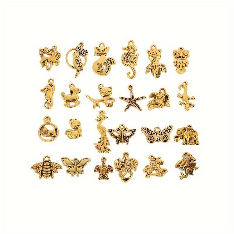 Mix av guld-berlocker - 30st