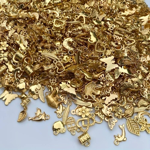Mix av guld-berlocker - 30st