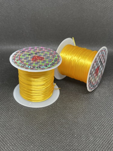 Elastisk tråd, mörkgul - 0,8mm x 10m