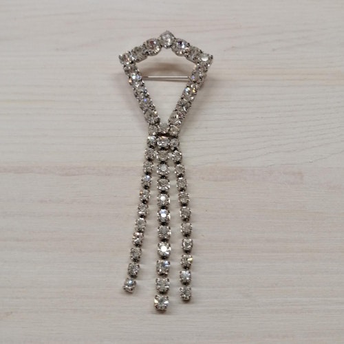 Vintage 8090-tal brosch silverf strass-stenar form som drake med hängande stenar