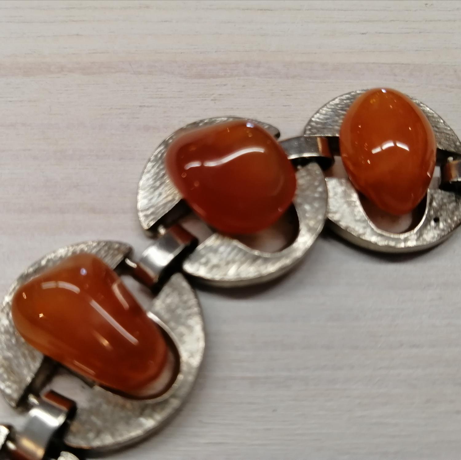 Vintage bijouteri armband silverf cirklar länkar med orange stenar i mitten