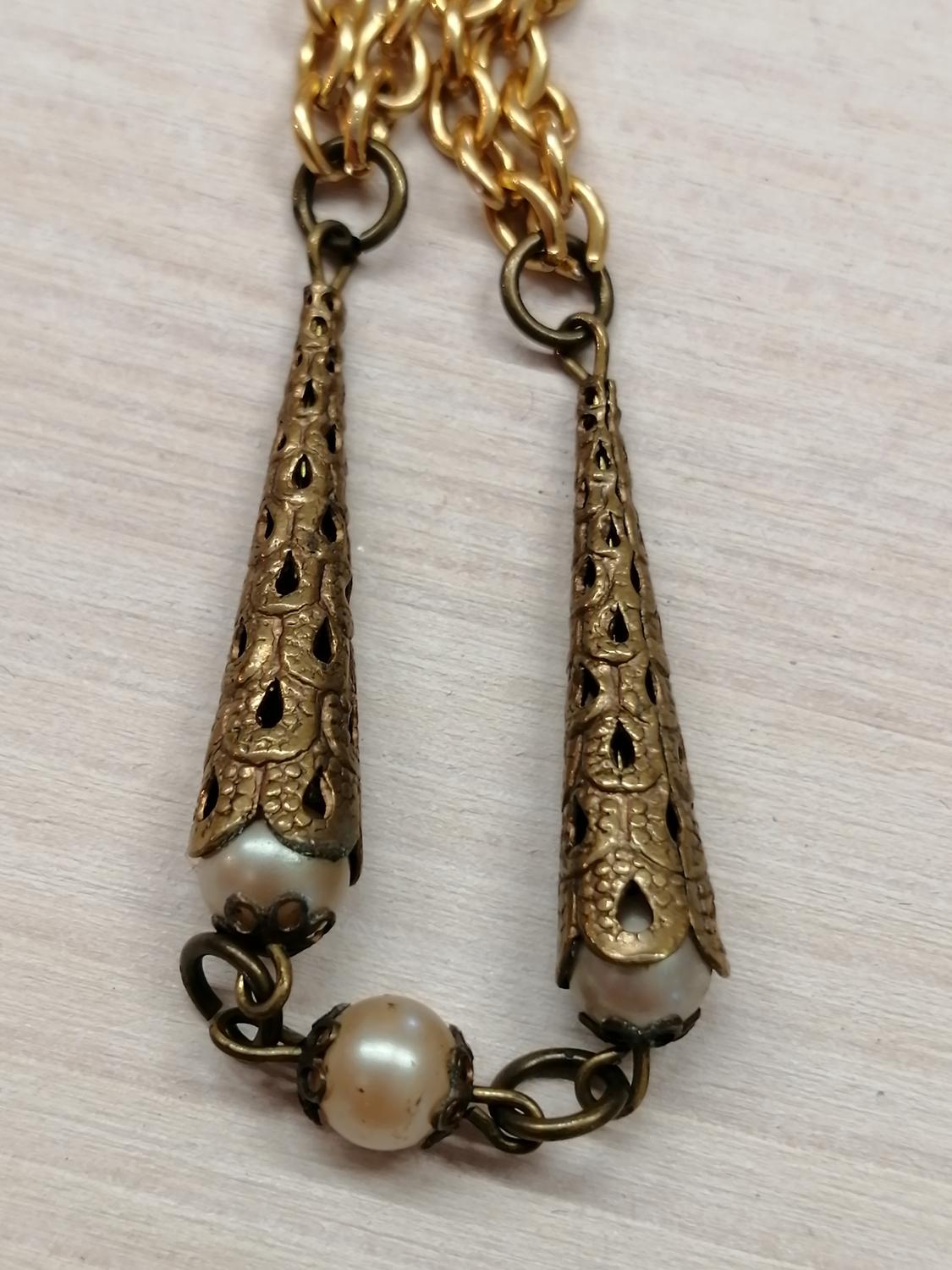 Vintage bijouteri långt halsband guldf och spetsiga koner silverf och pärlor