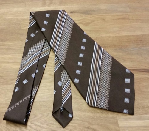 Retro slips bredare brun med mönster Polyester 70-tal