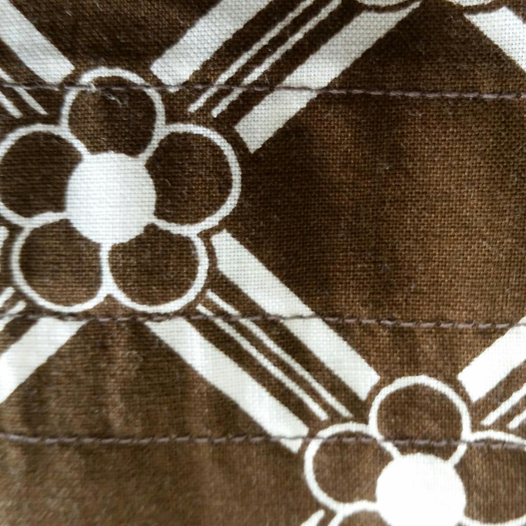 Retro retrotextil paradhandduk brun med vitt mönster bomull