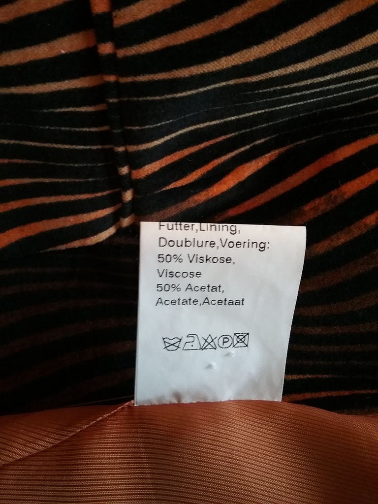 Zebra-randig sammetskavaj orange svart 70-tals-stil