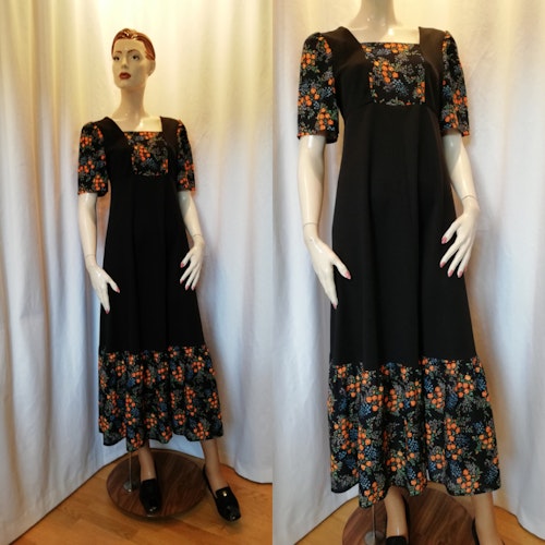 Vintage retro klänning långklänning svart och orangeblommig vid kjol 70-tal
