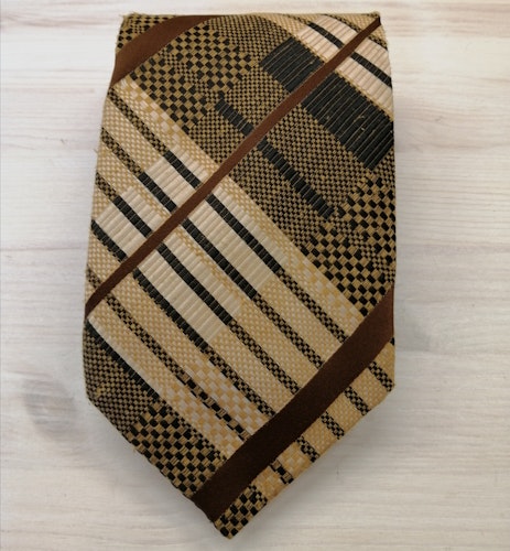 Vintage slips bred 70-tal rutig i bruna och beige nyanser grövre struktur