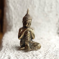 Buddha staty i guldfärgad brons