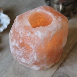 Orange ljuslykta i saltsten från Himalaya