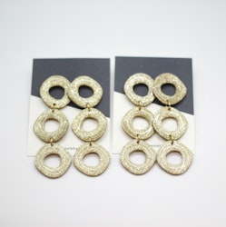 Uneven circle (guld/glitter)