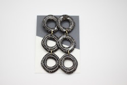 Uneven circle (glitter/svart)