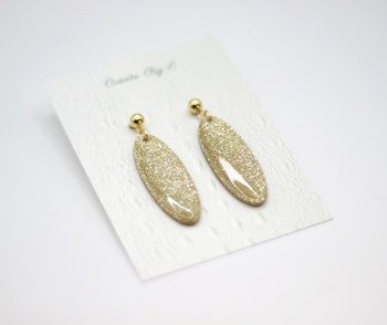 Oval (guld/glitter)