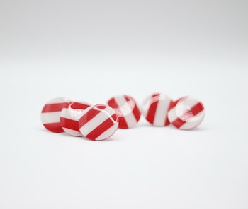 Röd/vita studs gloss