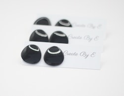 Uneven studs (svart/gloss)