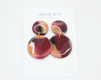 Glossy circle (vinröd/orange)