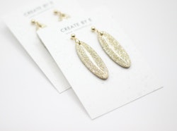 Oval (guld/glitter/gloss)