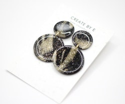 Glossy circle (svart/guldglitter/gloss)