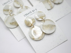 Glossy circle (vit/guldglitter)