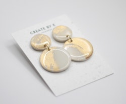 Glossy circle (vit/guld)