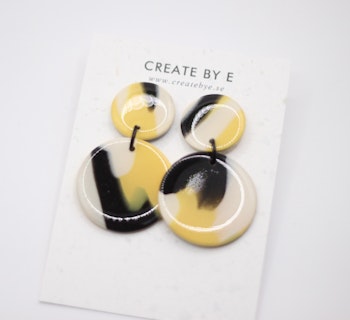 Glossy circle (gul/svart)
