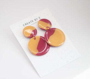 Glossy circle (cerise/orange)