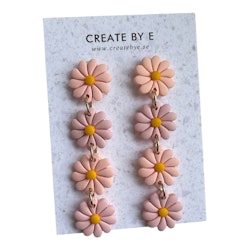 Blommor på rad (rosa/peach)