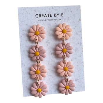 Blommor på rad (rosa/peach)