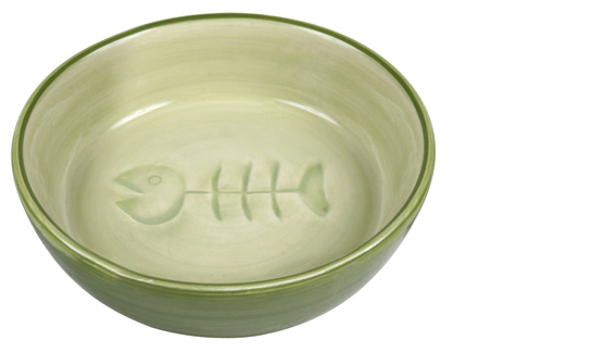 En grön keramikskål med fiskbensmotiv.