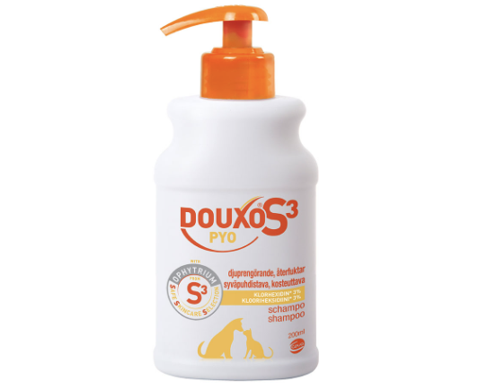Framsidan av Douxo S3 Pyo Schampo 200 ml. Flaskan är vit och orange.