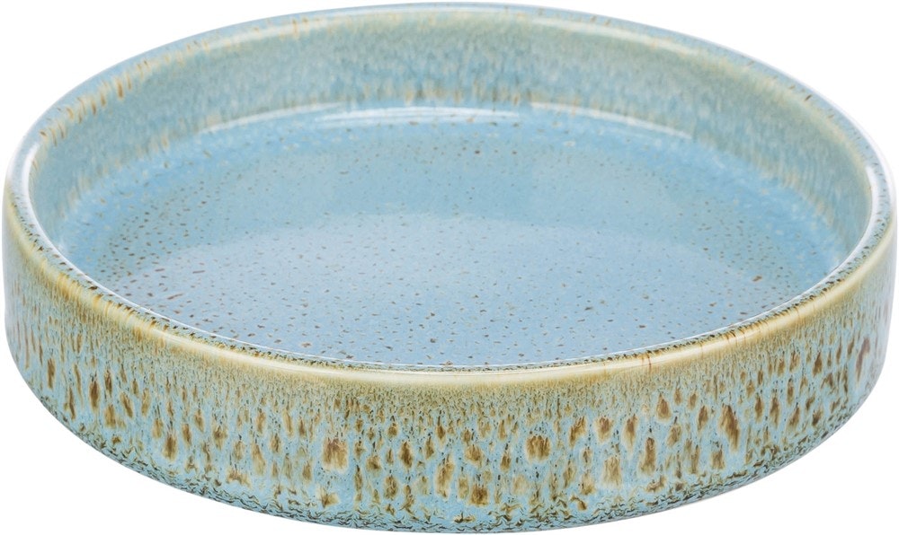 En blå kattmatskål i keramik.