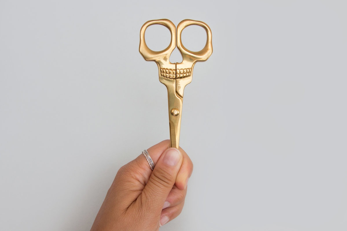 Brass scissors skull