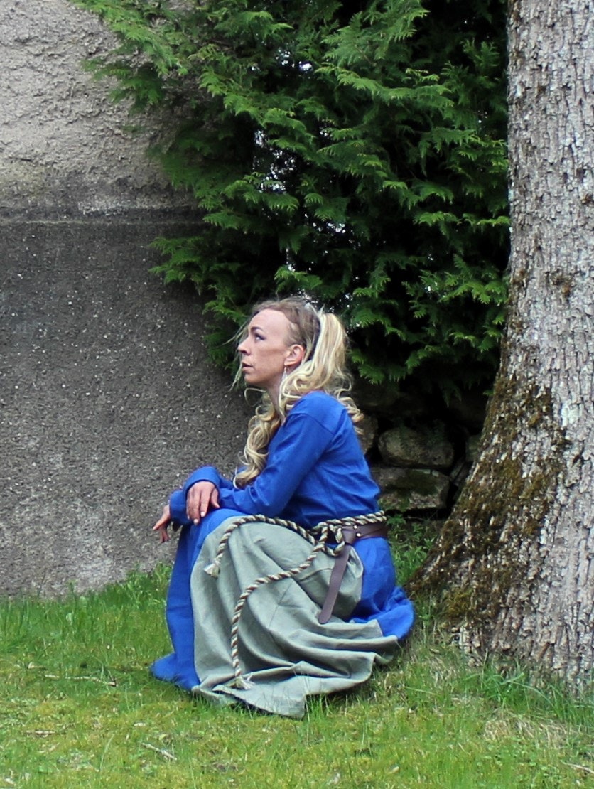 green and blue viking dress woman