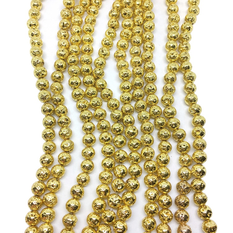Elektropläterade lavapärlor 6 mm guld