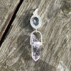 Faceted quartz crystal with Enhydro Brandenberg amethyst