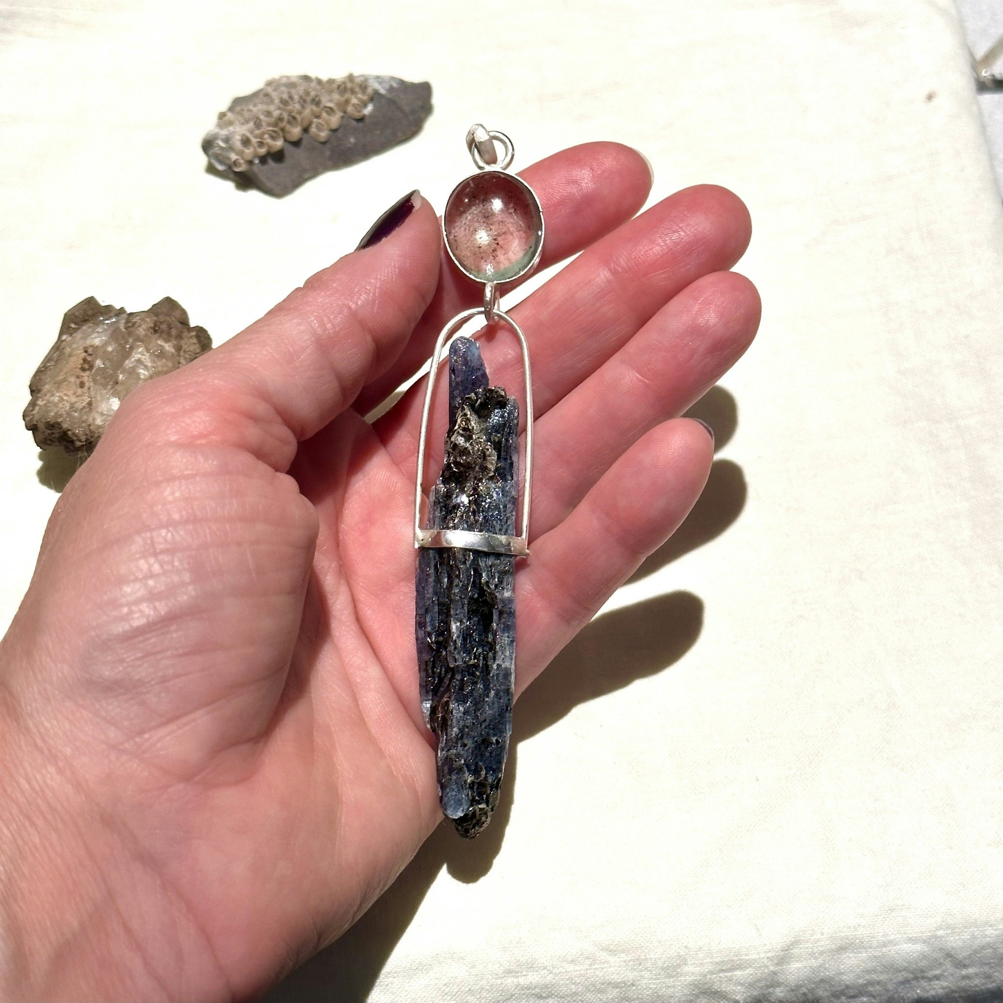 Aquamarine with exciting inclusions with blue kyanite