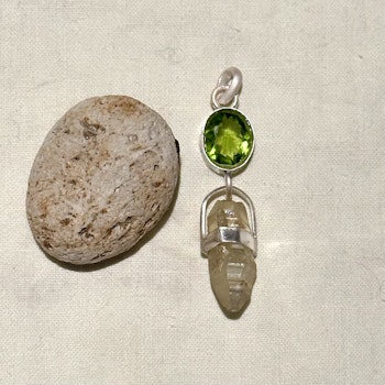 Peridot with raw sapphire