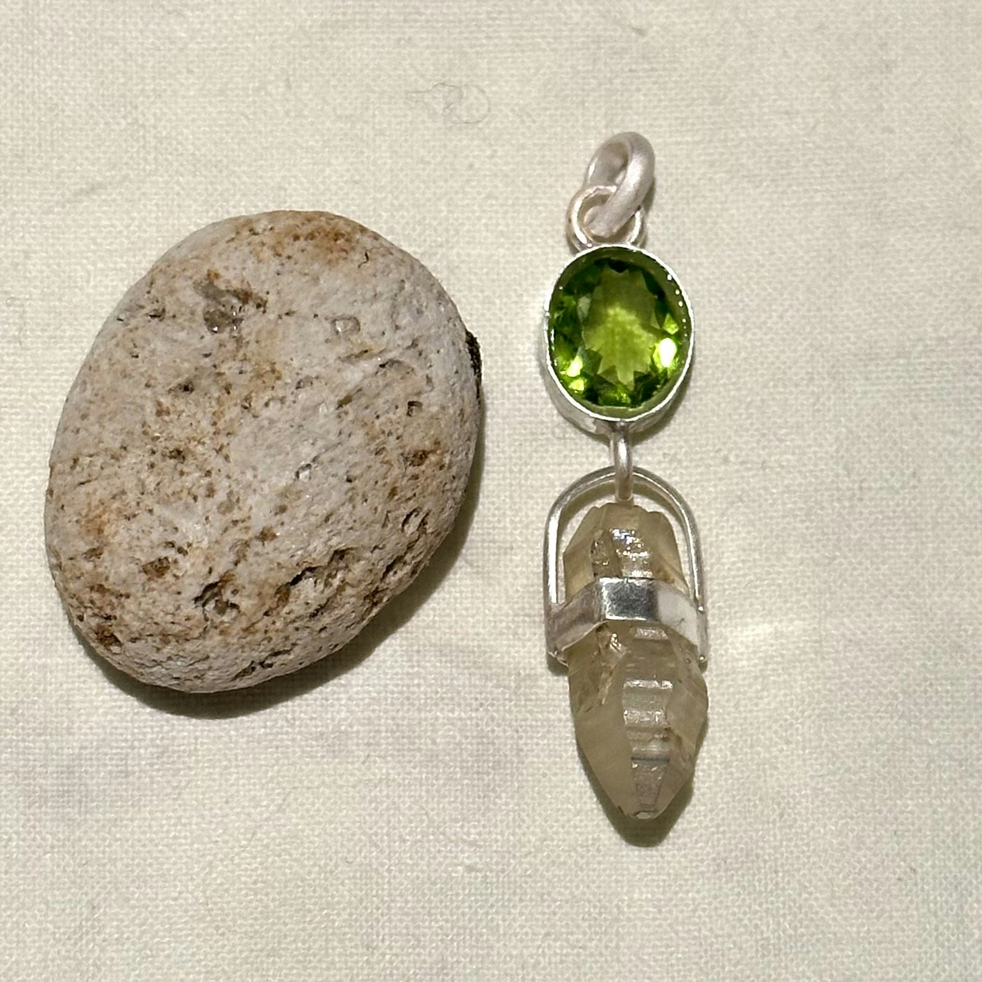 Peridot with raw sapphire