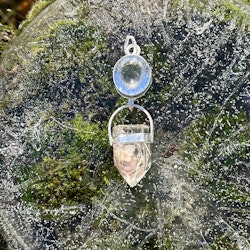 Faceted quartz crystal with lodolite with rutile quartz