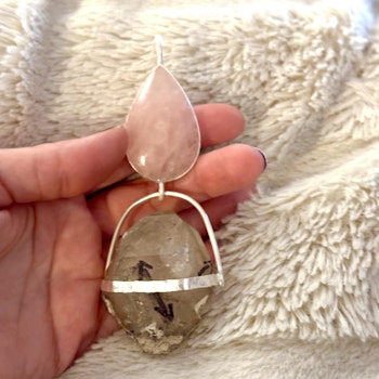 Rose quartz with double terminated Enhydro from the Himalayas