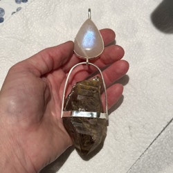 Apricot rainbow moonstone with smoky quartz Enhydro