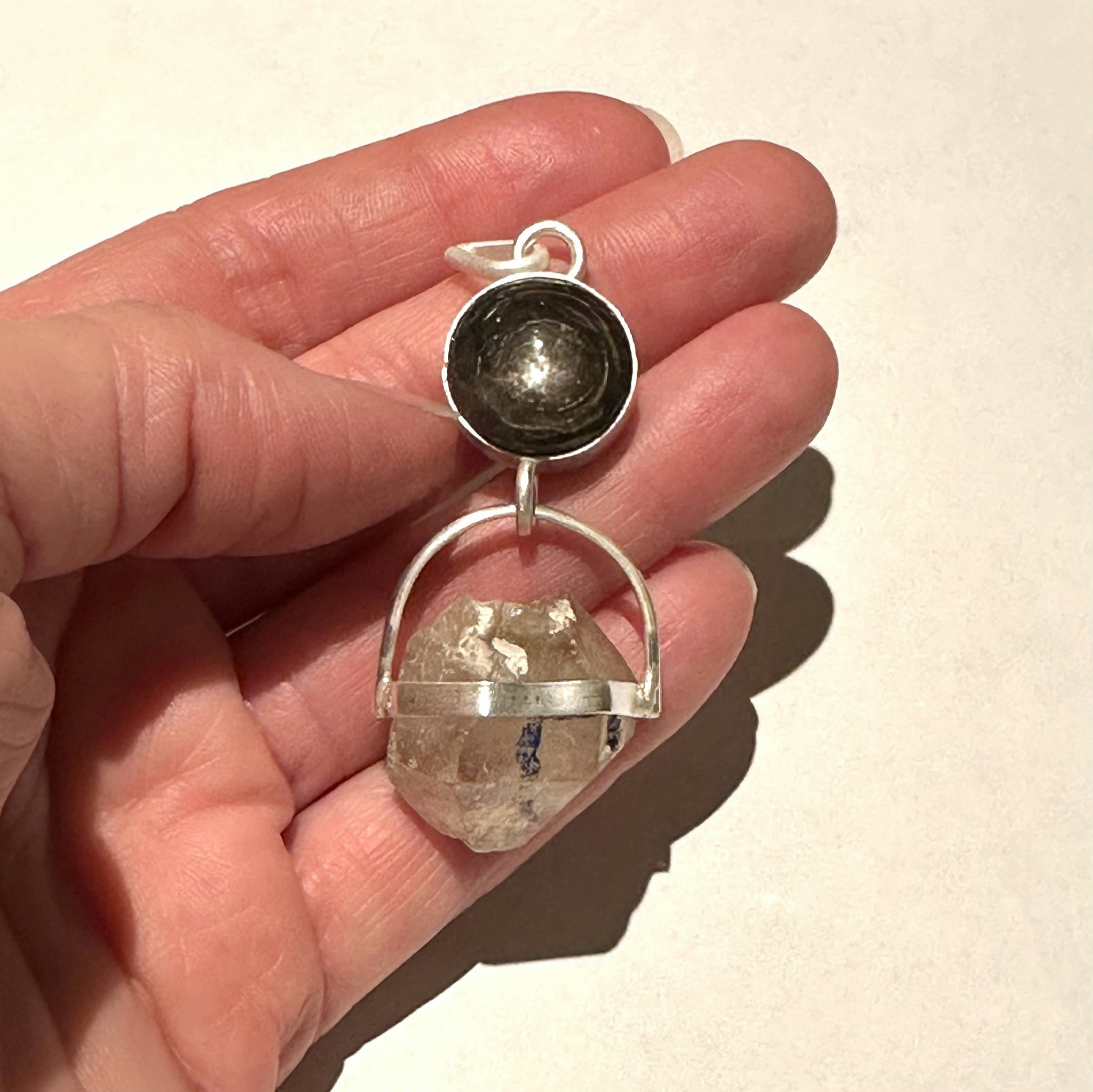 Black star Star sapphire with double terminated rock crystal with Enhydro from the Himalayas