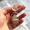 Rose quartz with double terminated Enhydro clear quartz crystal from the Himalayas