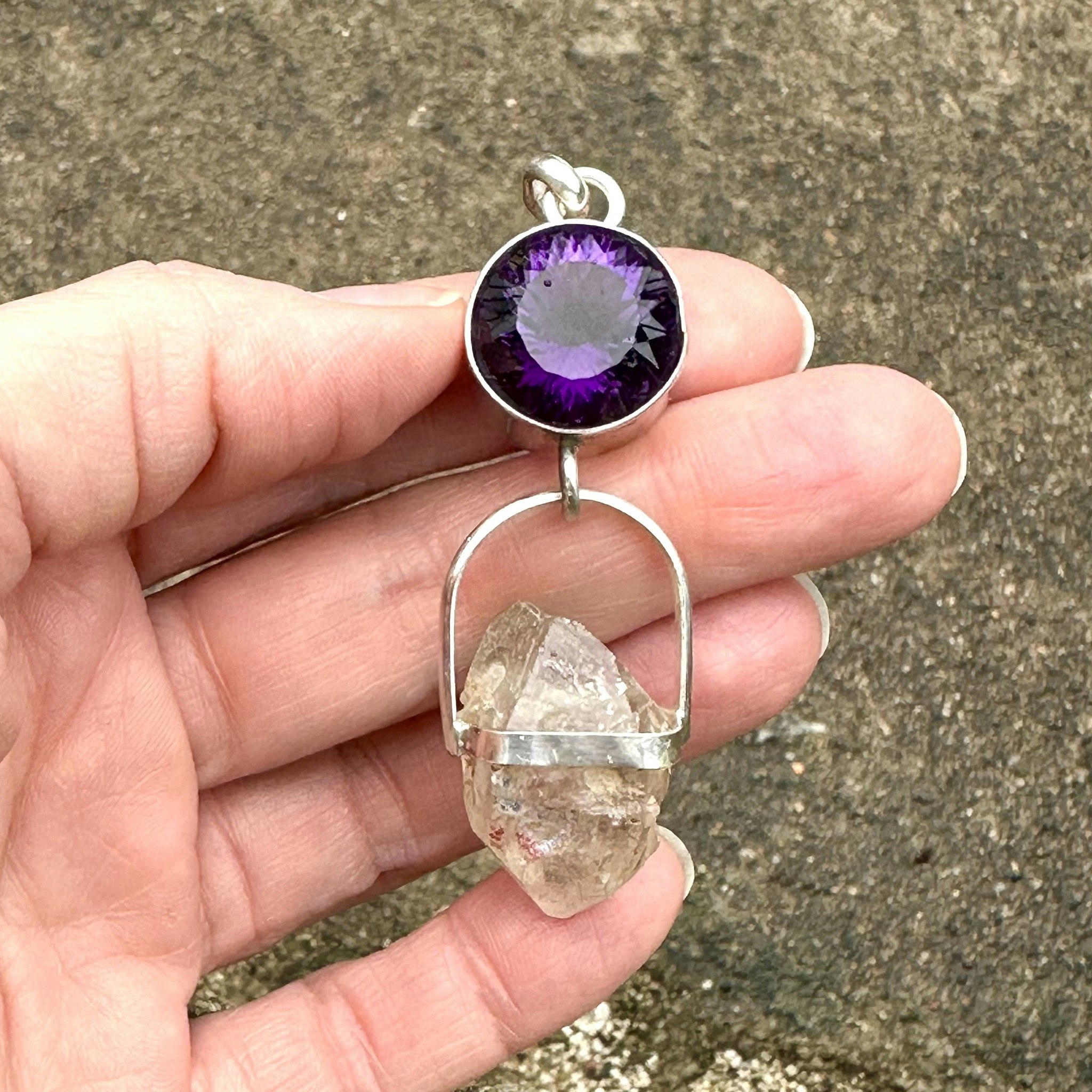 Amethyst with naturally double-terminated Enhydro from the Himalayas