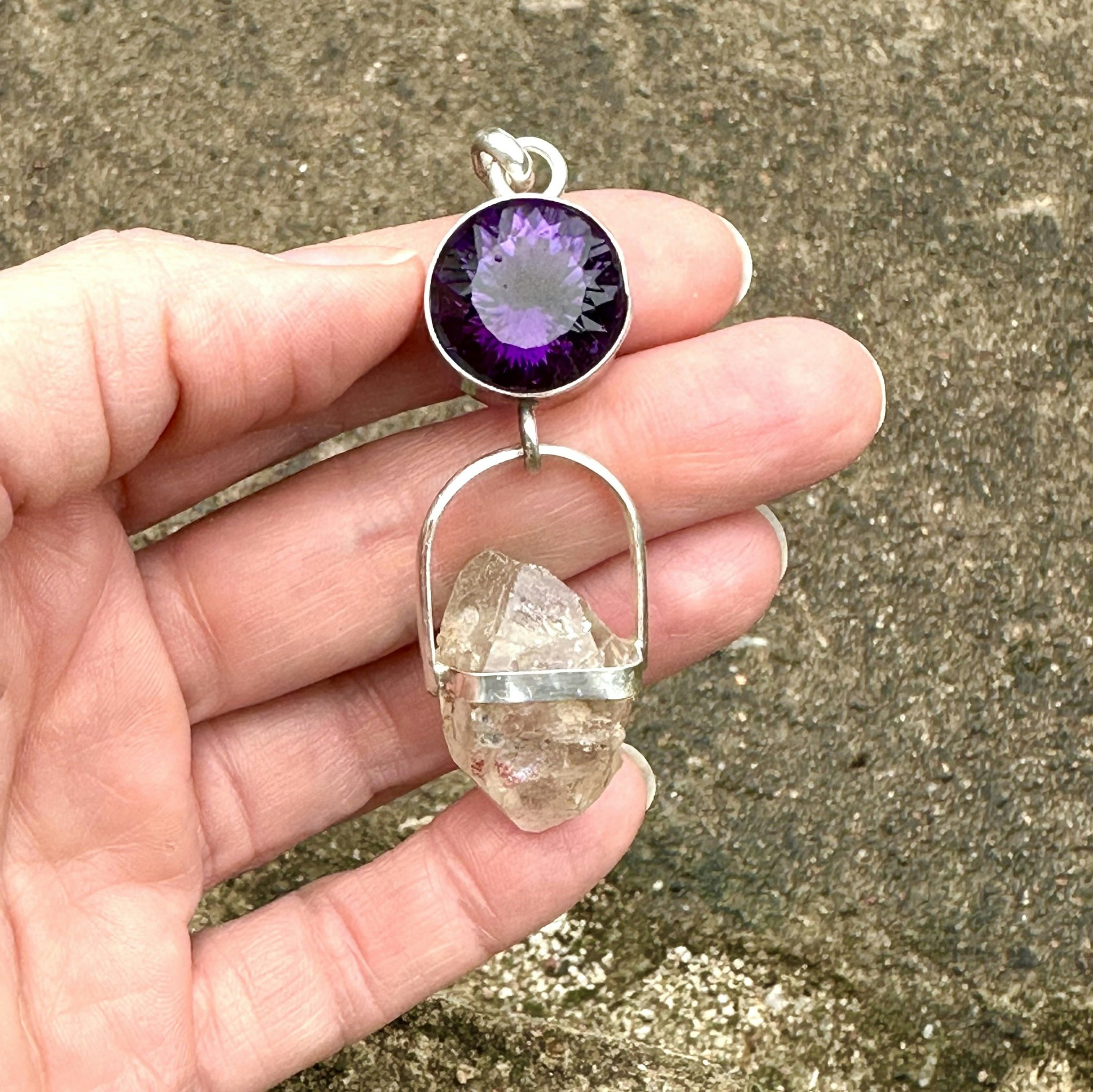 Amethyst with naturally double-terminated Enhydro from the Himalayas