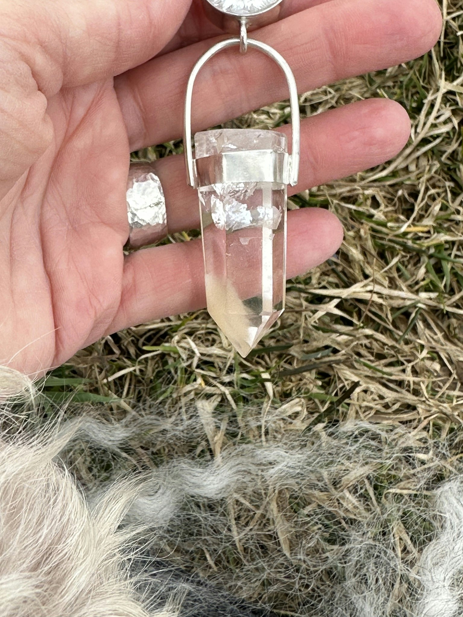 Clear quartz crystal with Angel Feather quartz